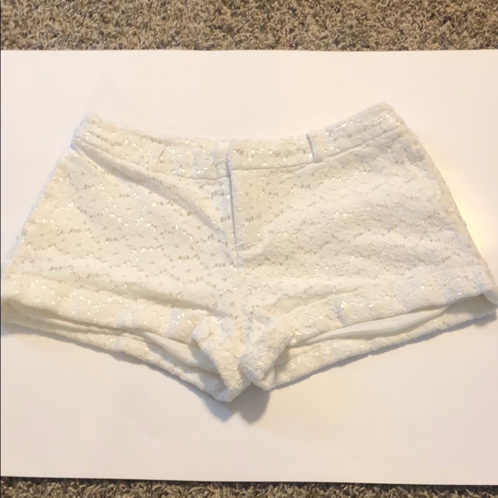 White lace shorts